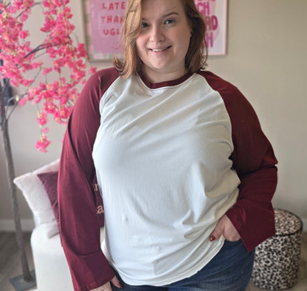 Basic longsleeve met gekleurde mouw